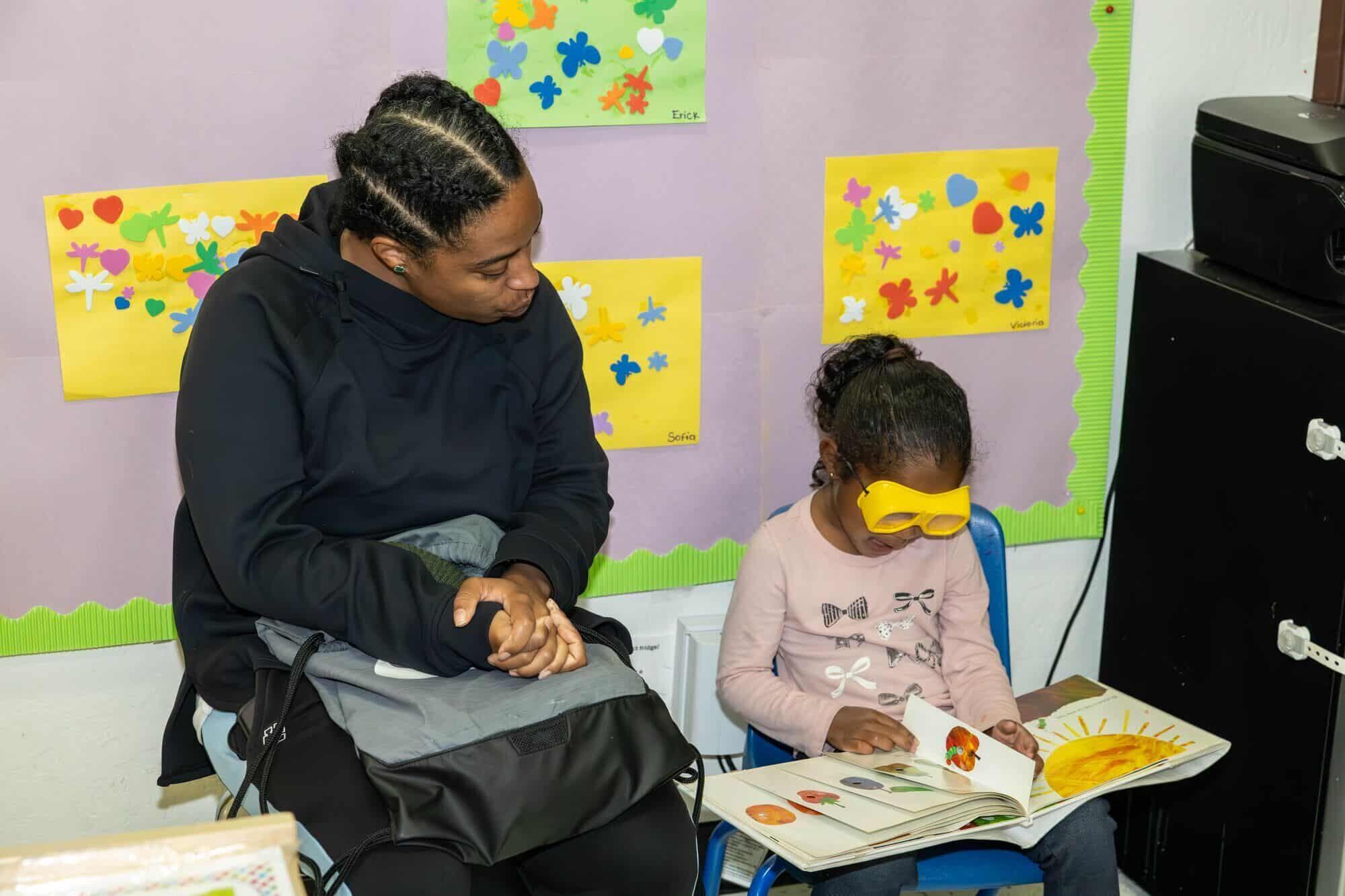 Child reading at RCCDP